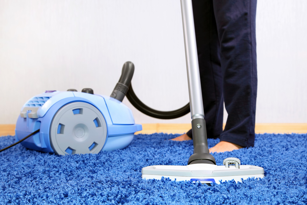 Limpieza de una alfombra con aspiradora